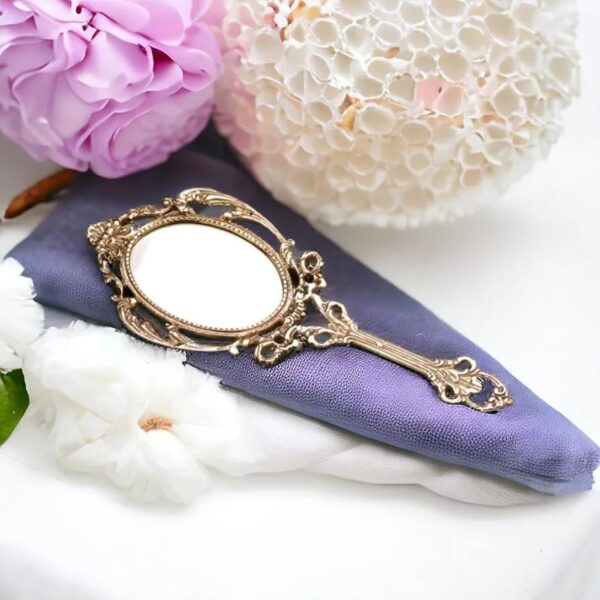 Brass hand mirror